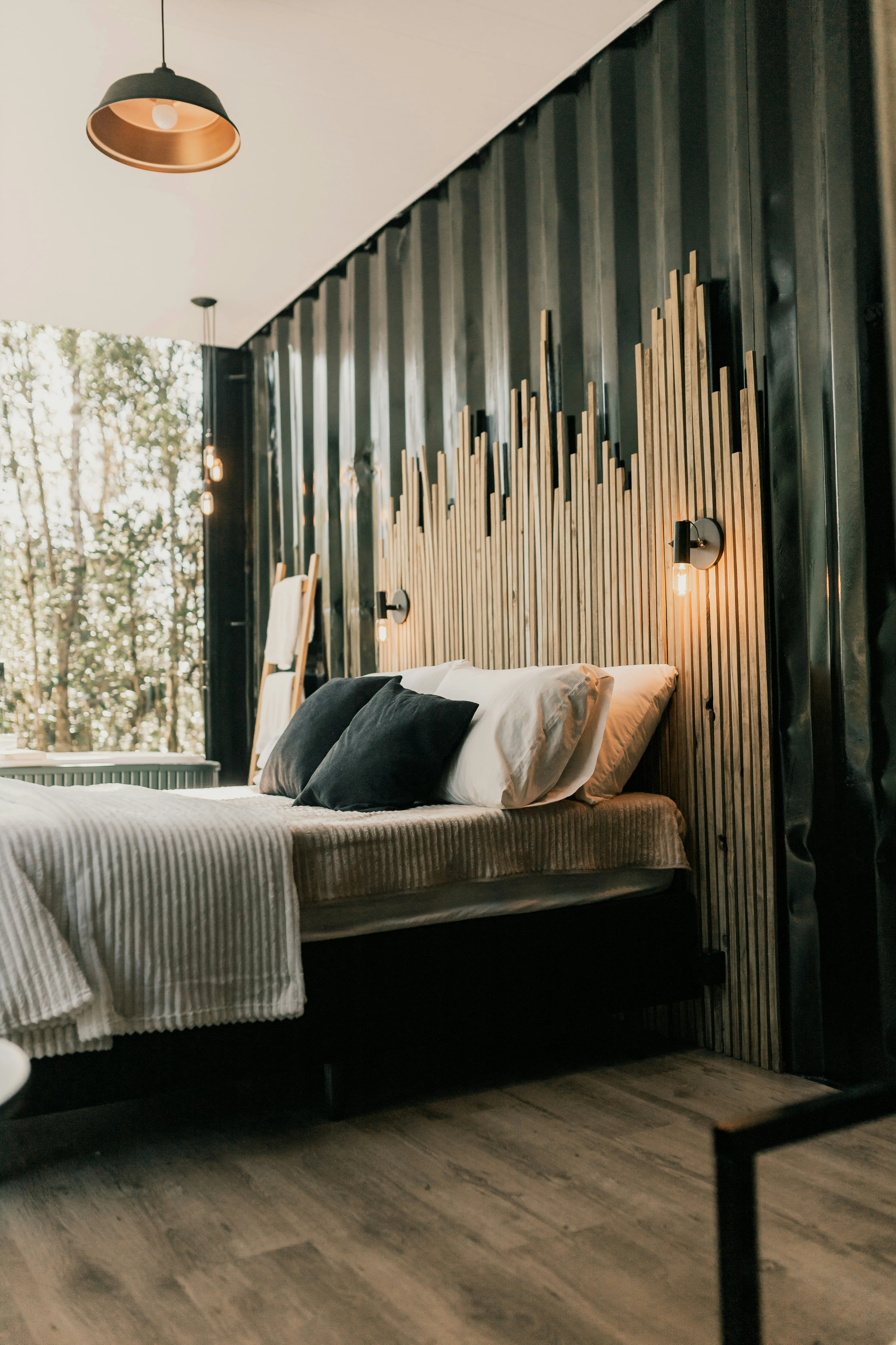 Bedroom with slatted window wall